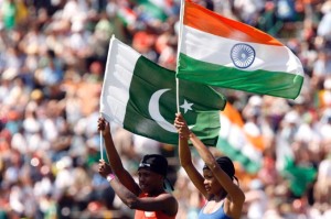 Dancers hold India and Pakistan national flags before the start of play in the ICC World Twenty20 cricket final match in Johannesburg